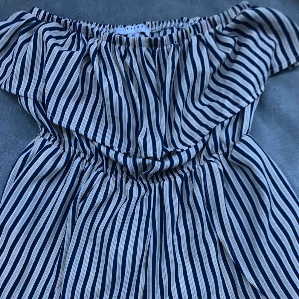 One yellow-orange shirt and a romper